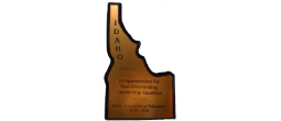 6" x 10" Shape of Idaho Plaque with
Gold plate engraved black letters.